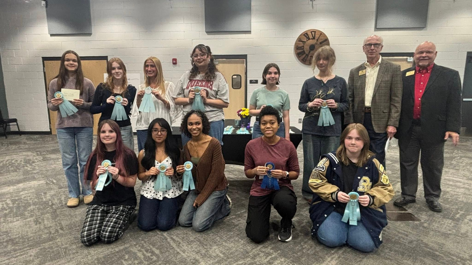 Image of group of 10+ people who participated in the art competition